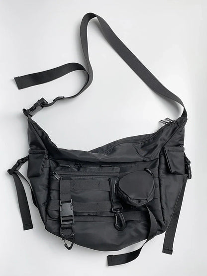 Premium nylon crossbody bag in black with adjustable strap and internal pockets for everyday use