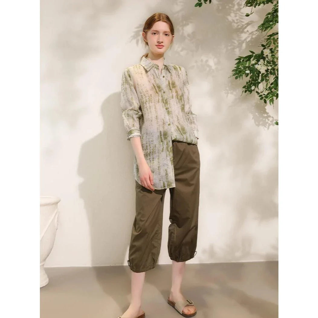 Elegant floral print ramie blouse for women, featuring a loose, comfortable fit and a polished turn-down collar design.
