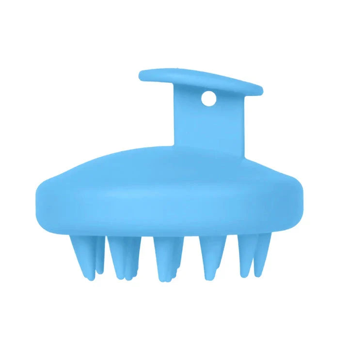 A green silicone scalp massager with soft bristles, designed to provide a soothing hair washing experience and promote healthy hair growth.