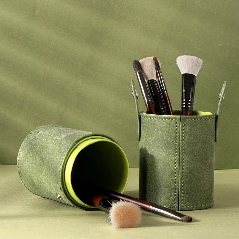 Premium green makeup brush holder with ample storage space for brushes, pencils, and other beauty essentials