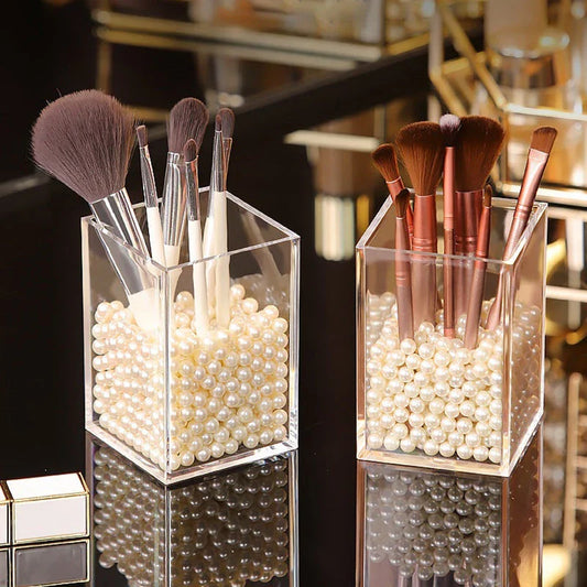 Stylish makeup brush holder with clear acrylic display rack for neatly organising cosmetics and beauty essentials