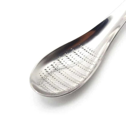 Premium stainless steel multi-purpose grater with ergonomic handle for easy grating and shredding in the modern British kitchen