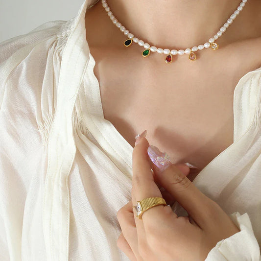 Elegant titanium steel necklace with a minimalist, sophisticated design and a polished, golden finish