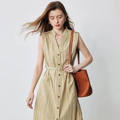 Elegant sleeveless midi shirt dress with V-neck and side pockets, perfect for summer in the UK
