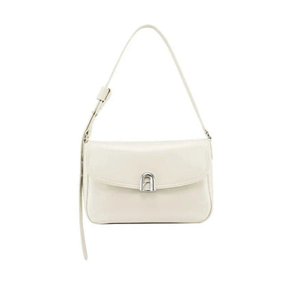 Stylish leather shoulder and crossbody bag in burgundy colour, with a square silhouette and sleek design
