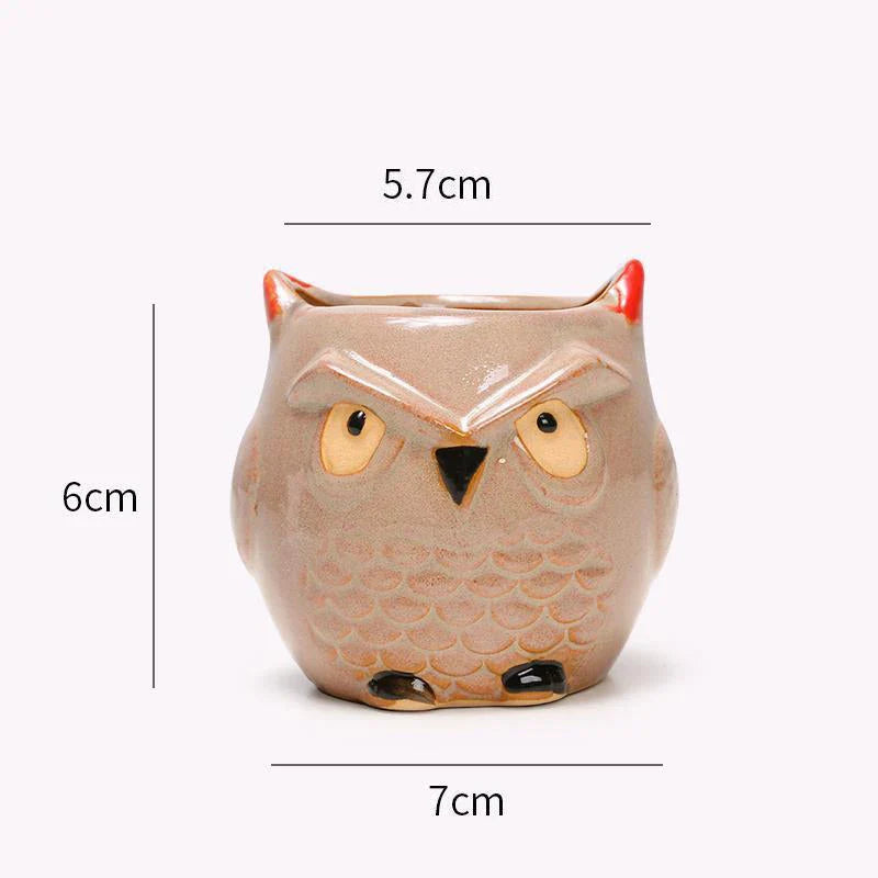 Adorable owl-shaped ceramic flower pot in white, suitable for succulents and small plants
