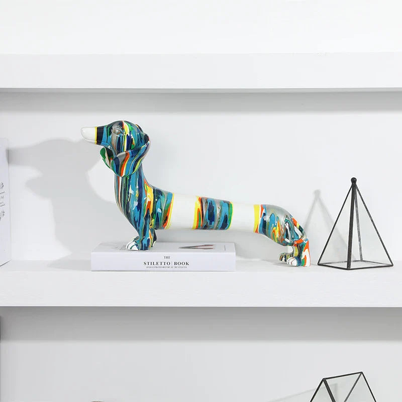 A delightful resin figurine depicting a charming Dachshund dog, featuring a modern and simplified design with vibrant colors.