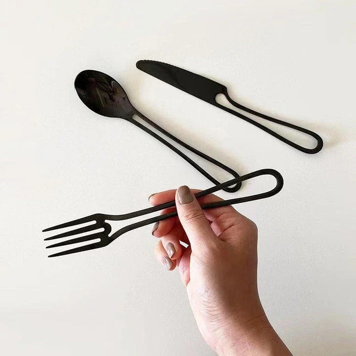 Sophisticated 304 stainless steel cutlery set with sleek black finish for elegant dining in the UK