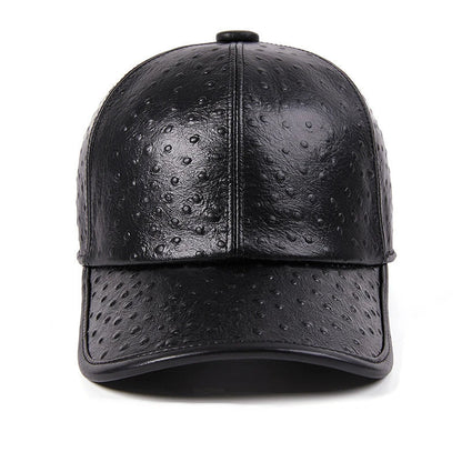 A stylish men's baseball cap made from warm, first-layer cowhide leather with an eye-catching ostrich pattern design.