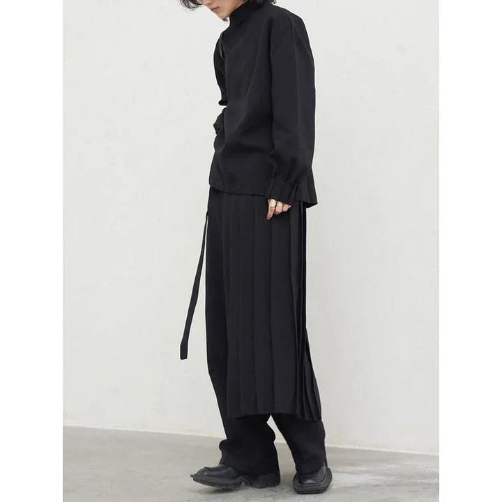 Fashionable pleated sweatshirt and wide-leg trousers set in grey, featuring a relaxed, comfortable silhouette and modern design.