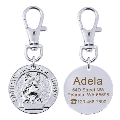 A premium silver dog ID tag with a customized engraved design, providing both style and practical functionality for your beloved canine companion.