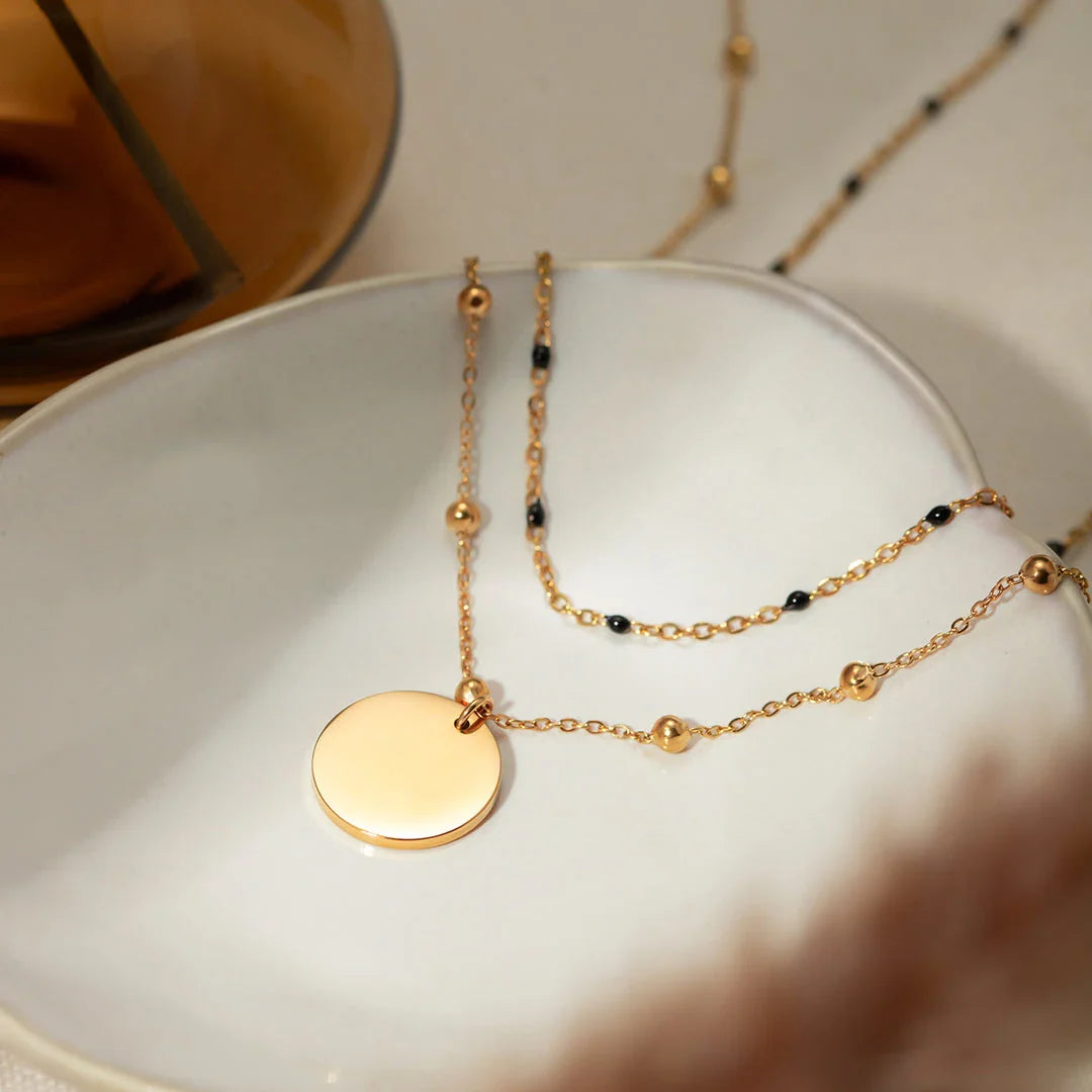 Elegant 18K gold plated black rice bead necklace, a sophisticated accessory for stylish women in the UK