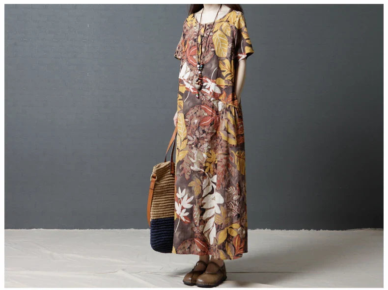Elegant cotton and linen long dress in a classic blue hue, showcasing the high-quality natural fabrics and timeless British design.