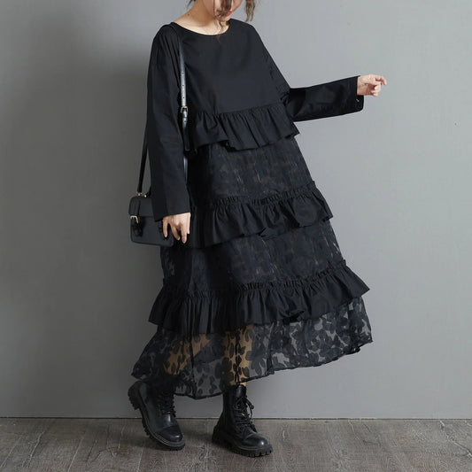 Plus size black lace dress with long sleeves and a loose, relaxed fit for a timeless and sophisticated look