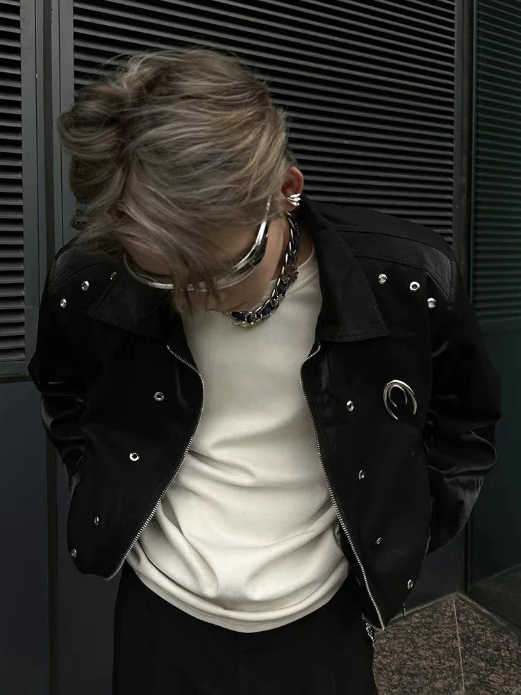 A stylish padded shoulder jacket in black and silver grey, featuring a structured silhouette and a comfortable, wrinkle-resistant design.