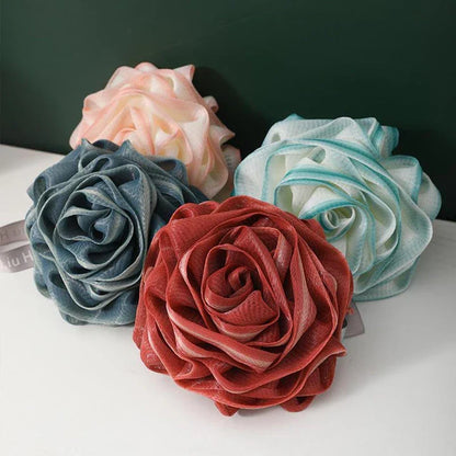 Luxurious flower-shaped shower puffs in vibrant colours for a rejuvenating spa-like cleansing experience