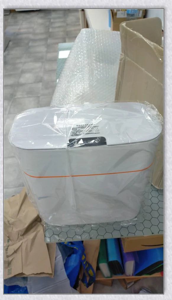 Sensor-powered bin with sleek design and touch-free motion-activated lid for effortless, hygienic waste disposal