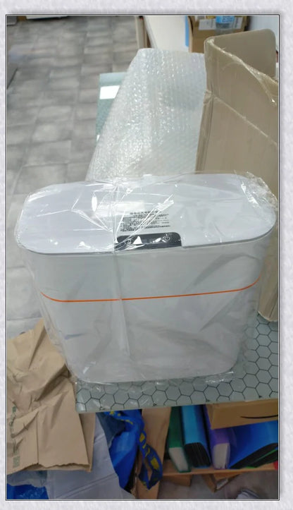 Sensor-powered bin with sleek design and touch-free motion-activated lid for effortless, hygienic waste disposal