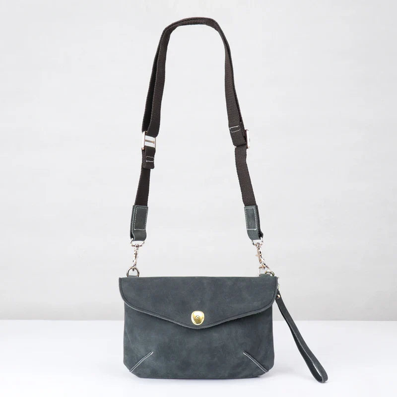 Premium handcrafted leather messenger bag in a classic British design, featuring a sturdy construction and spacious interior for the modern gentleman's everyday essentials.