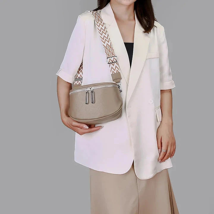Premium genuine leather tote bag with adjustable strap and interior compartments for fashion-forward women