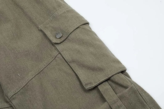 Premium purple streetwear cargo jeans with multiple pockets, wide-leg silhouette, and zippered placket for adjustable fit