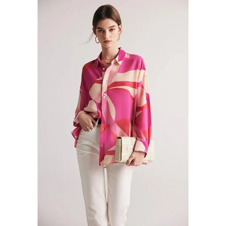 Elegant silk crepe de chine blouse in a unique print design, featuring a loose, straight fit and classic collar for a sophisticated yet comfortable look.