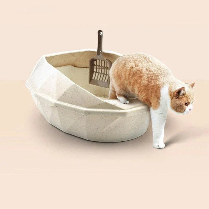 A stylish, crystal-shaped detachable semi-enclosed cat litter tray in pink colour, designed to provide privacy and reduce litter scatter for your feline friend.