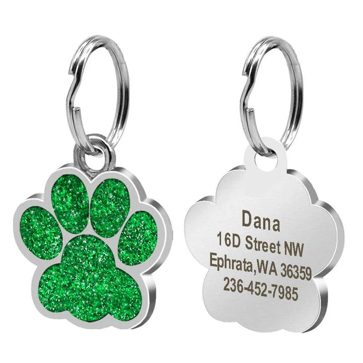 Paw-shaped pet ID tag with rhinestone embellishments, designed for safety and style