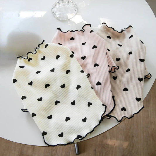 A cosy and stylish embroidered bear waffle vest for pets, perfect for keeping your furry friend warm and cute during the colder months.