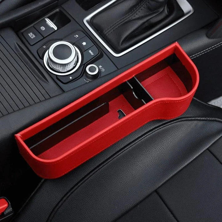 Premium multifunctional car seat organiser with various compartments for storing phones, chargers, pens, and other car essentials