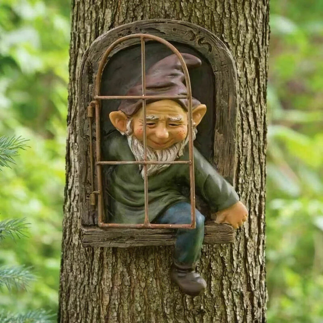 Naughty Elf Out The Door Tree Hugger Garden Statue, a charming resin gnome figure designed to hang on trees or peek out from windows and doors