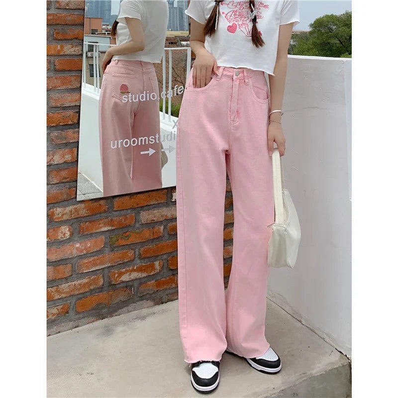 Premium cotton denim high-waist wide-leg trousers in a flattering, figure-hugging silhouette
