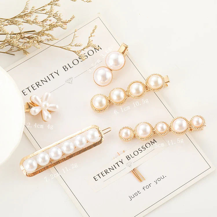 Elegant silver-toned hair clip with a beautiful pearl flower design, a timeless British-inspired accessory