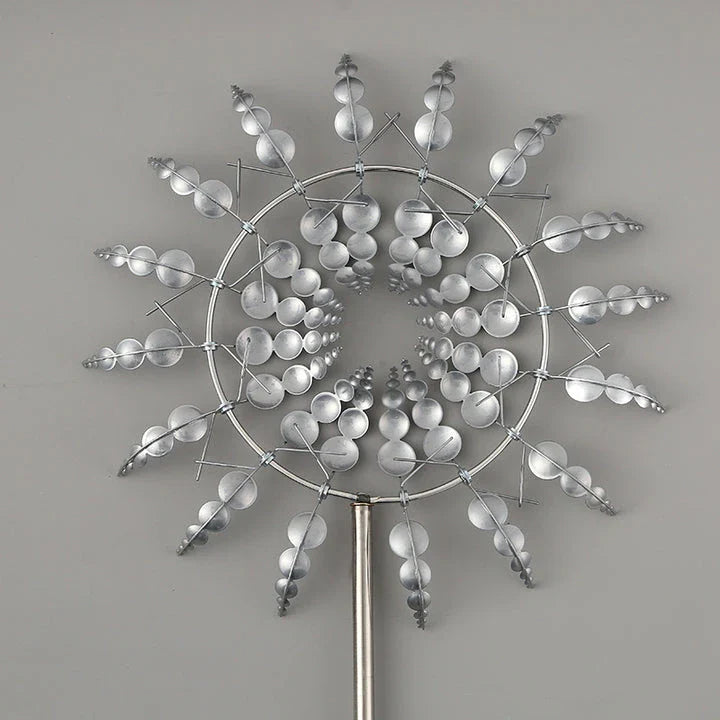 Elegant metal garden windmill decoration with gentle movement, perfect for adding charm to outdoor spaces