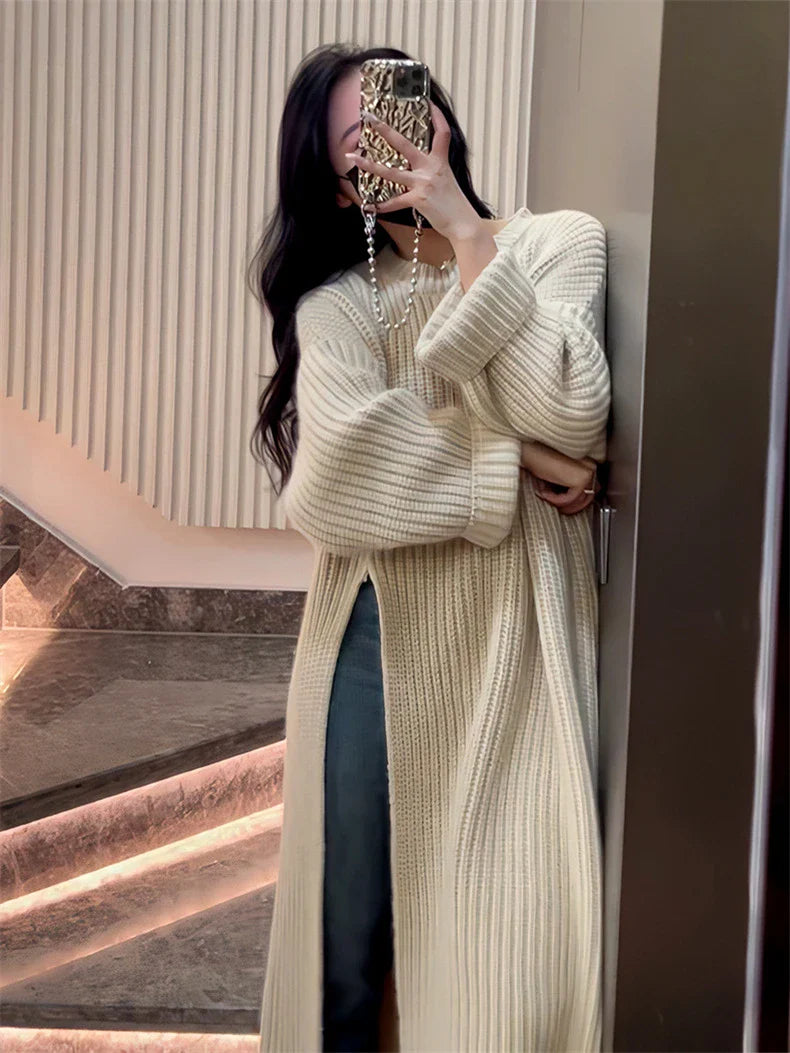 Relaxed mid-length jumper dress in a variety of colours, featuring an A-line silhouette and premium knit fabric for a comfortable, flattering fit.