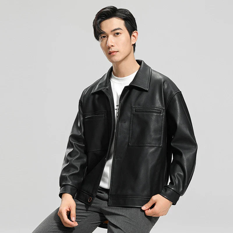 Handsome men's leather motorcycle jacket with lapel collar, dimensional pockets, and durable PU leather construction