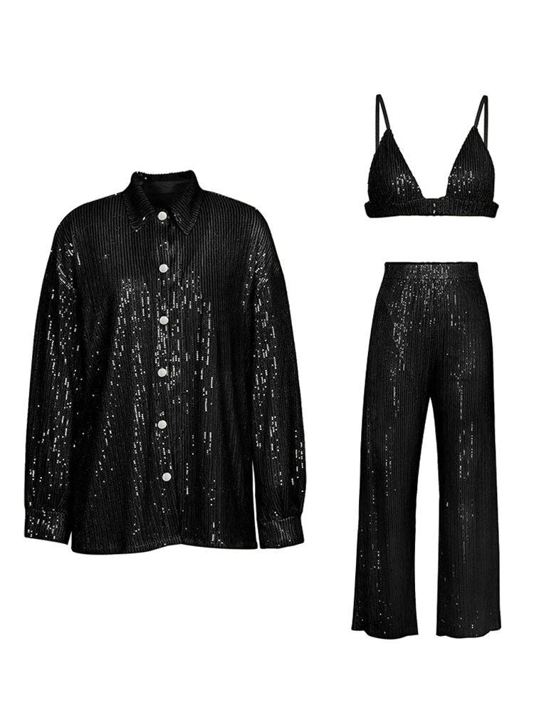 Elegant woman wearing a luxurious sequin top and pants set, perfect for a glamorous evening event