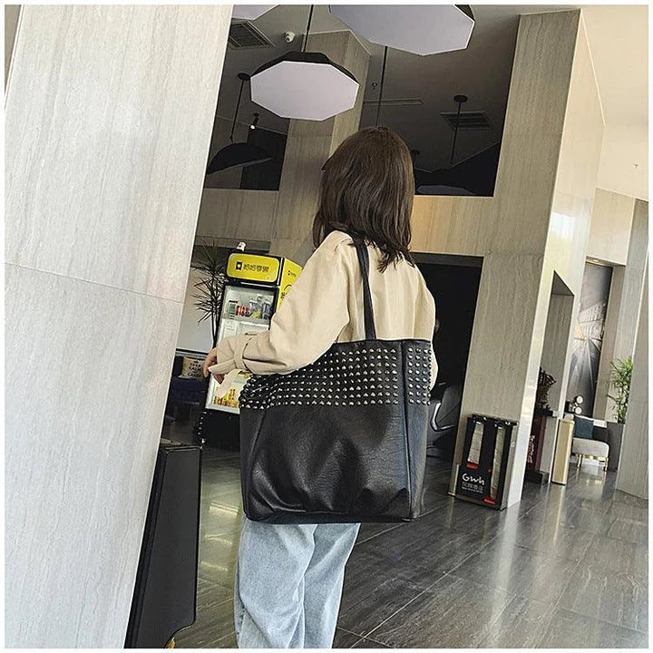 Premium British leather tote bag in black, featuring a large capacity design and stylish, versatile appeal.