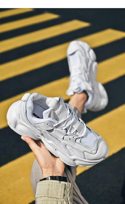 Premium casual trainers with a sleek, minimalist design and durable rubber sole for versatile, comfortable wear.