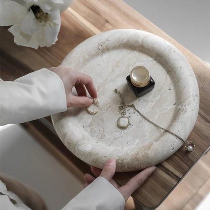 Elegant travertine serving tray with a smooth, round design and neutral beige colour for versatile home decor use