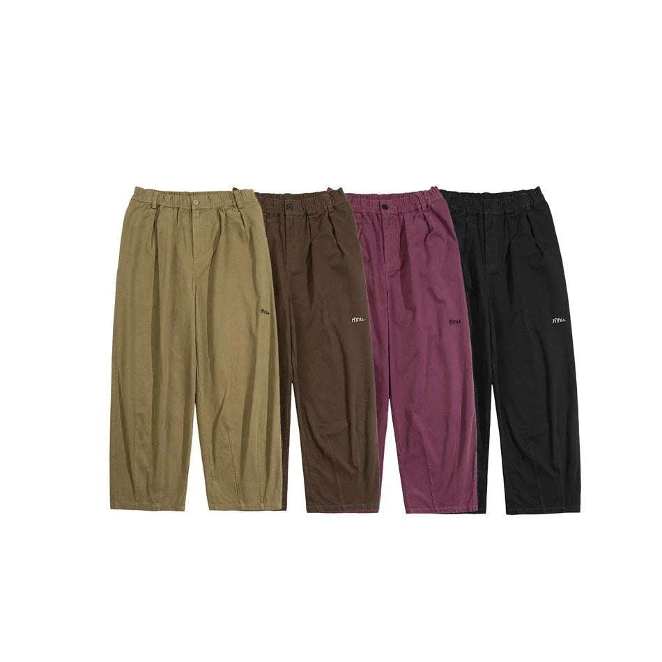 Sophisticated men's casual trousers in various colours, featuring a tailored straight-leg design and mid-rise waistline for a polished, British-inspired look.