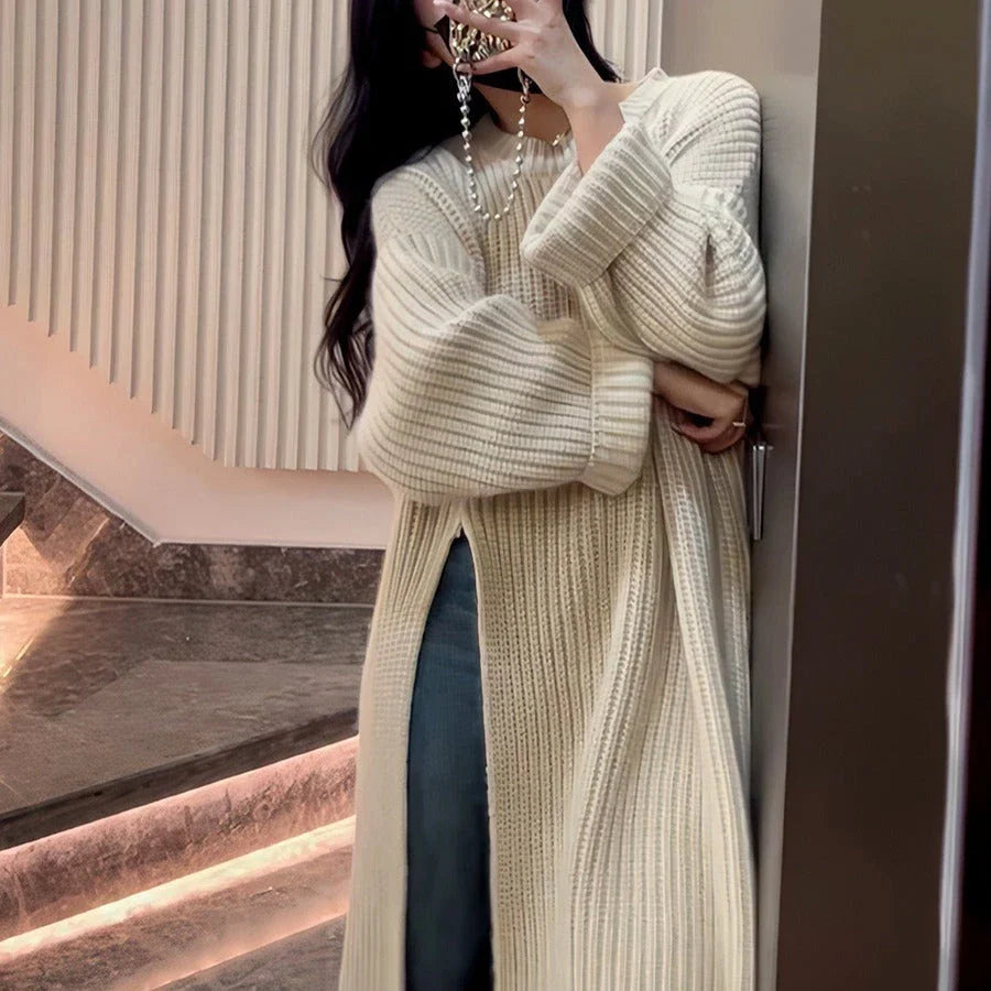 Relaxed mid-length jumper dress in a variety of colours, featuring an A-line silhouette and premium knit fabric for a comfortable, flattering fit.