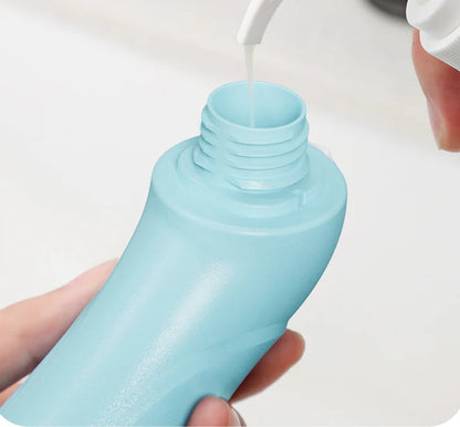 Premium hand-held pet bath brush with soft bristles and ergonomic grip for gentle grooming and cleaning
