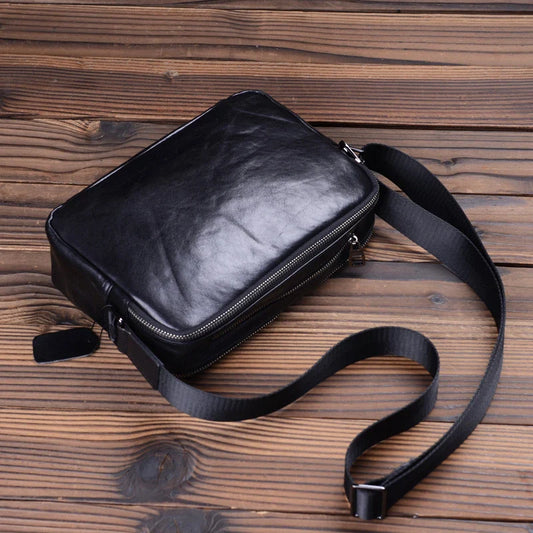 Handmade premium leather shoulder bag for men, featuring a cross-body design and retro-inspired style