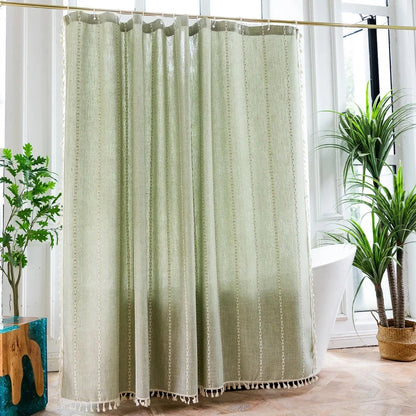 Premium bohemian tassel shower curtain with unique stitching design, waterproof coating, and durable linen blend material for a relaxing bathroom oasis