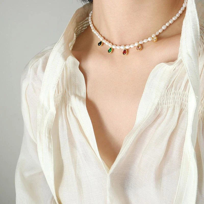 Elegant titanium steel necklace with a minimalist, sophisticated design and a polished, golden finish