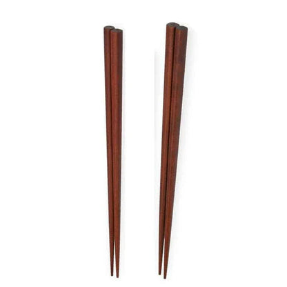 A set of four high-quality wooden chopsticks in a sleek, Japanese-inspired design