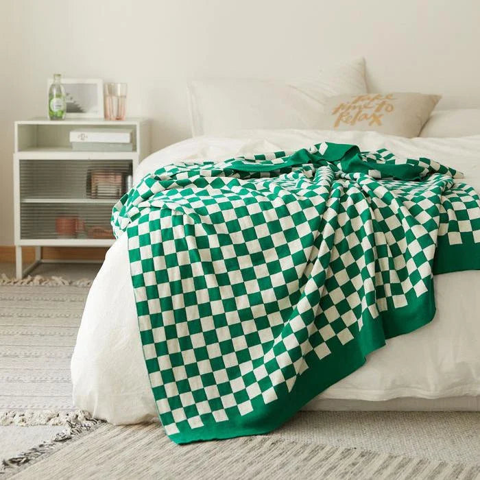 Cosy tartan check cotton knit throw blanket in earthy tones for stylish home decor
