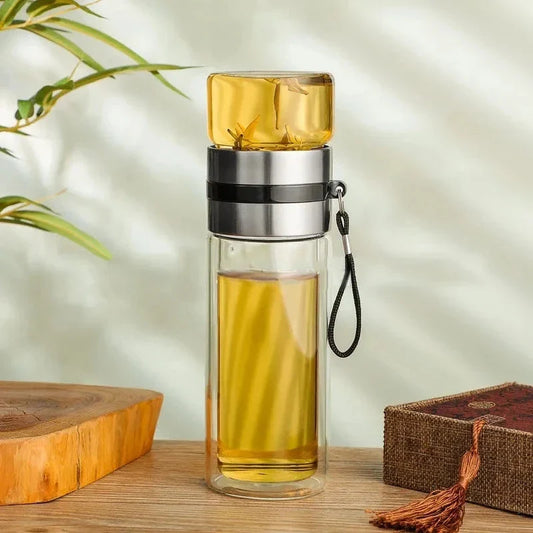 Elegant 400ml double-walled glass tea infuser bottle with wooden accent, perfect for brewing loose leaf tea or infusing water