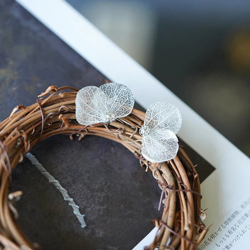 Elegant hydrangea flower air ear clips with mosquito coil functionality, made from premium alloy material